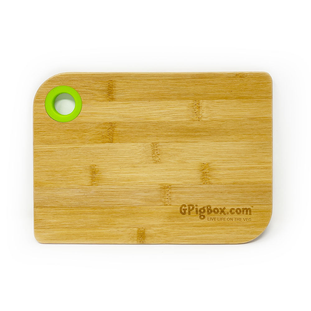 bamboo cutting board with gpigbox.com logo laser cut into the bottom right corner